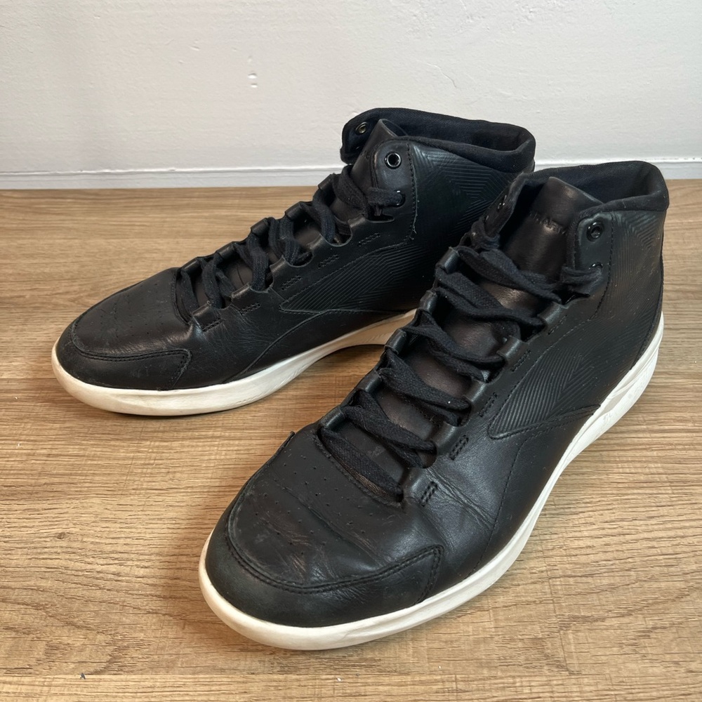 Women’s size 10 Under Armour Charged Pivot Black High-Top Sneakers